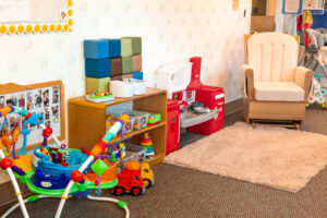 A room with toys and furniture in it